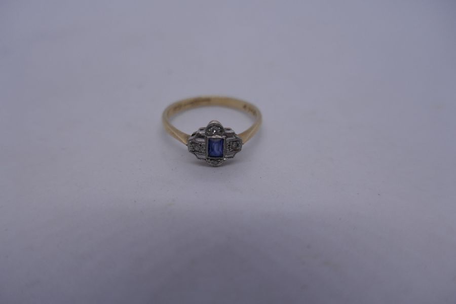 9ct and platinum Art Deco scallop design ring set central pale sapphire surrounded diamonds marked 9