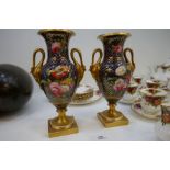 A pair of antique Coalport style vases having floral and gilt decoration with swan handles, height 2