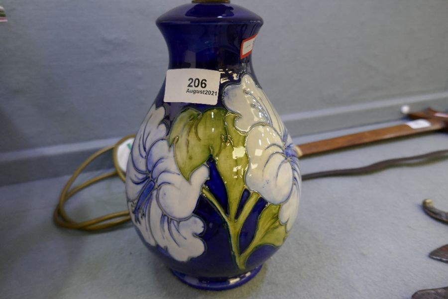 A Moorcroft blue glazed table lamp decorated flowers, 20cm tall - Image 2 of 6