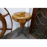 A Victorian trumpet sewing table having floral inlaid decoration