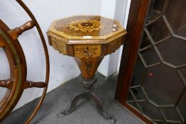 A Victorian trumpet sewing table having floral inlaid decoration