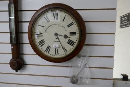 A Victorian mahogany round wall clock having fusee movement the dial marked Grimshaw, Baxter and JJ