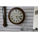 A Victorian mahogany round wall clock having fusee movement the dial marked Grimshaw, Baxter and JJ