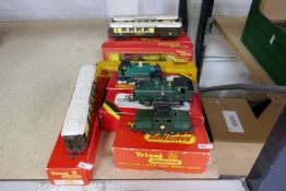 A quantity of Hornby OO gauge boxed locomotives and coaches along with a Tri-ang boxed Helicopter ca