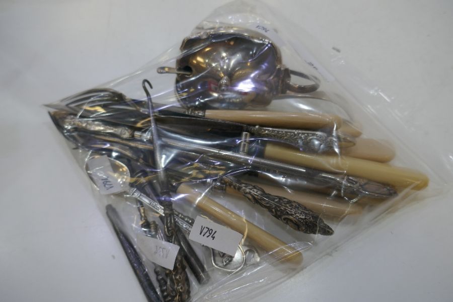 A large quantity of silver and plated items to include silver rim handled cutlery, silver salt, pen.