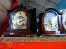 Two wooden cased and brass dialed mantle clocks