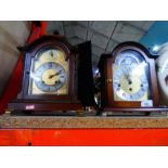 Two wooden cased and brass dialed mantle clocks