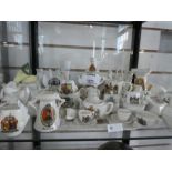 Shelf of various crested china ware