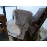 Velvet upholstered wing back fireside armchair and another