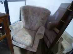 Velvet upholstered wing back fireside armchair and another