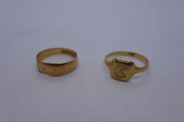 2 18ct yellow gold rings, one an initial inscribed signet ring, both marked 18, approx. 8.9g