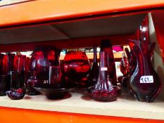 Various selection of Cranberry glass, including stem glasses, brandy glasses, etc