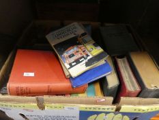 A box of vintage books on various themes