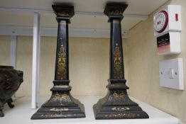 Jennen's and Bettridge; a pair of old papier-mâché candlesticks, height 35cms
