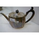 A large silver tea pot with gadroon design. Hallmarked Sheffield 1890 possibly, with Mappin and Webb