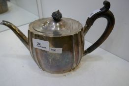 A large silver tea pot with gadroon design. Hallmarked Sheffield 1890 possibly, with Mappin and Webb