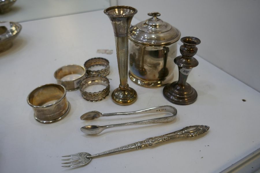 A mixed lot comprising a silver tea caddy Birmingham 1919 A and J Zimmerman Ltd, four silver napkin - Image 2 of 4