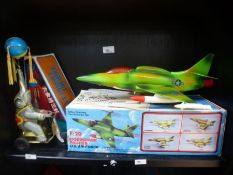 Vintage Toy Battery US Air Force tiger shark fighter mint, in box, along with tinplate clockwork ele