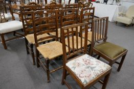 A set of 6 oak ladderback chairs having rush seats and 2 other chairs