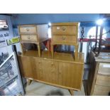 Mid century light sideboard with 3 central drawers flanked cupboards and a pair of 2 drawer bedside