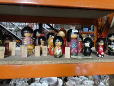 A quantity of various Japanese wooden dolls