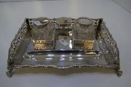 A heavy silver desk inkstand with pierced decoration hallmarked Sheffield 1913 William Hutton and So