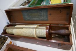 An antique Fuller's cylindrical slide rule by Stanley, in original mahogany case