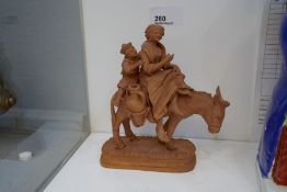 A 20th century Italian terracotta donkey with mother and child