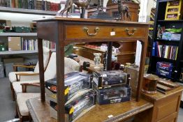 An antique mahogany side table having one drawer on square chamfered legs 86cm