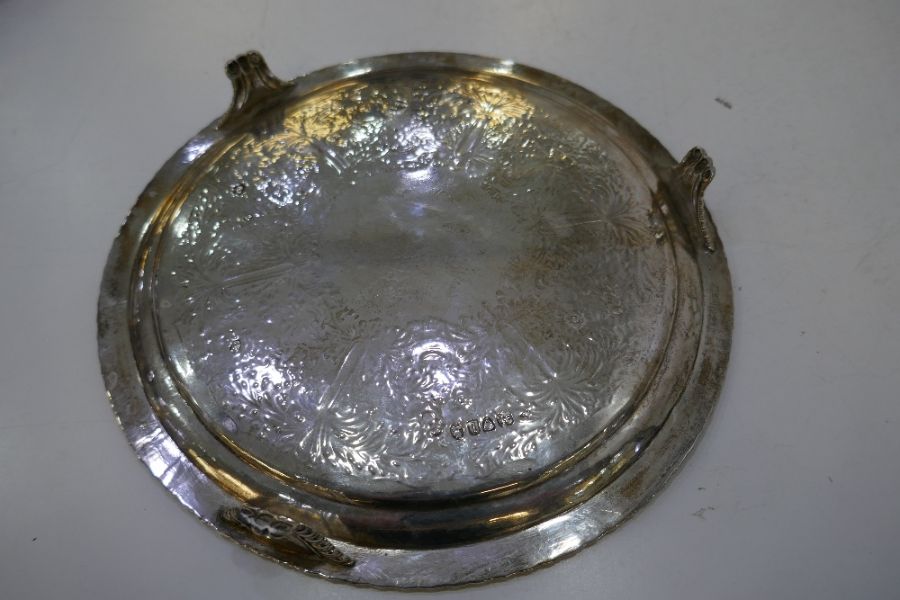 A very heavy circular Georgian silver tray of decorative foliate design, on three feet, with gadroon - Image 5 of 6