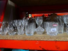 Large collection of crystal drinking vessels incl. whisky tumblers, champagne flutes etc