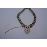 9ct yellow gold curb link bracelet with heart shaped clasp, safety chain AF, marked 375, 22.1g appro