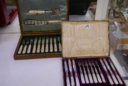 An unusual silver fish serving set with bone handles in an oak case. High quality, nice silver set w