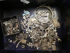 Collection of silver and white metal costume jewellery including bangle, charms, charm bracelet, nec