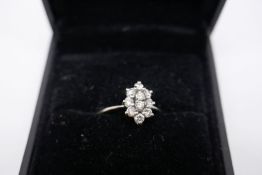 Possibly 18ct white gold navette shaped diamond cluster ring, ten round cut brilliant diamonds, appr
