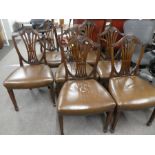 A set of eight reproduction Hepplewhite style mahogany dinning chairs including a pair of carvers