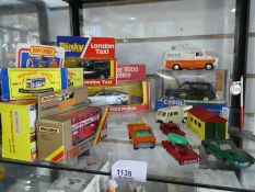 Selection of mostly boxed die cast vehicles. (Dinky and Matchbox)