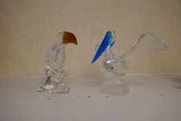 Royales de Champagne; a glass model of Pelican and a Toucan