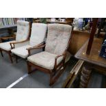 Two similar 1970s style Parker Knoll armchairs and similar rocking armchair