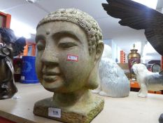 Weathered terracotta Asian buddha bust.