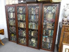 A Georgian mahogany break front bookcase having 4 Astragal doors, 229cm long