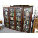 A Georgian mahogany break front bookcase having 4 Astragal doors, 229cm long