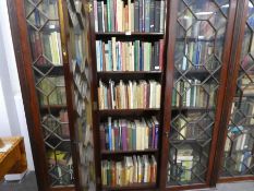 5 shelves of books including political, business and sociology