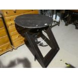 An Oak joint stool with two items and a wooden fruit bowl