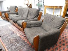 A G Plan 1970's suite part of the saddle set, comprising of three seat sofa, pair of armchairs and s