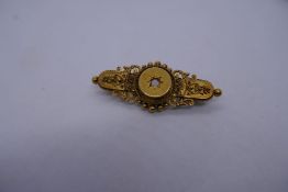 15ct Victorian ornate mourning brooch with central stone, missing but present, 4.5cm, 5.9g aprrox.