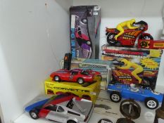 Various vintage radio-controlled cars, with boxes, some made by Corgi, etc