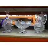 Three pieces of lead cut glass crystal, including decanter, water jug, Stuart crystal, and a fruit b