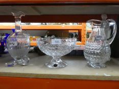 Three pieces of lead cut glass crystal, including decanter, water jug, Stuart crystal, and a fruit b