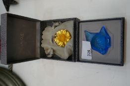 A Lalique turquoise fish and a Lalique floral brooch